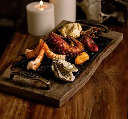 pescados y mariscos de alta calidad a la parrilla en Chambao Los Cabos